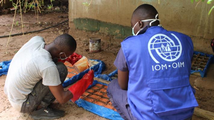 Yusupha assists returnees as part of an ongoing cash-for-work soapmaking initiative