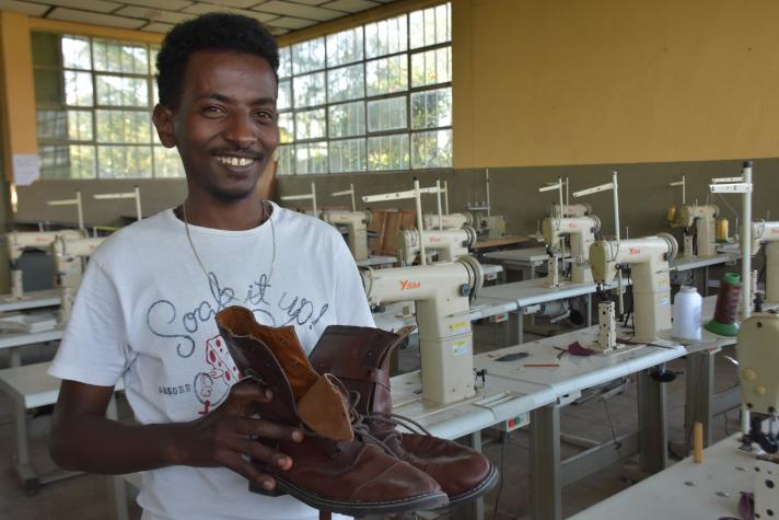 Abay , joined the MSME cluster in Modjo for leather goods production, empowered by the project’s comprehensive footwear making, mastering the art of shoemaking. ©UNIDO