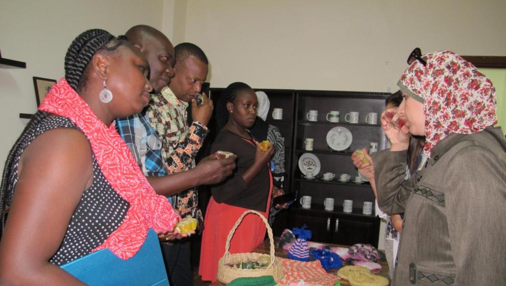 Members of the Kenyan delegation observe handmade products made by victims of trafficking as part of vocational training at the shelter