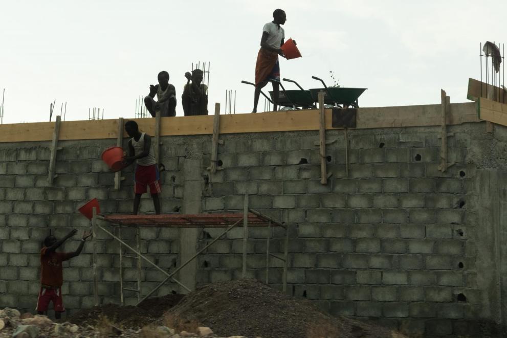 An average of 165,000 Ugandans are working in the Middle East ; Uganda has taken steps to improve their job and life security An average of 165,000 Ugandans are working in the Middle East ; Uganda has taken steps to improve their job and life security