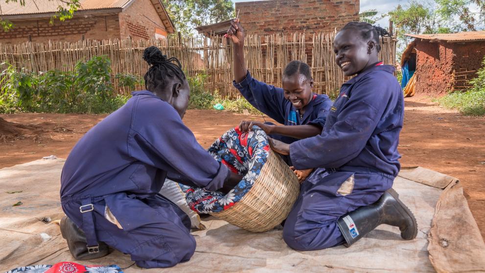 Refugees living in a settlement in Western Uganda, have been trained as local Artisan with skills in creating different energy efficient technologies to promote access and utilization of clean energy at household level. © Save the Children