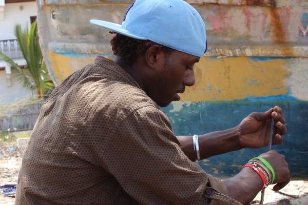 Ali Hassan working in his workshop - @Ruth Sarmwei