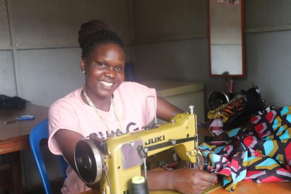 Medina Maneno, owner of a tailoring business-Adjumani town, Uganda © Enabel Uganda