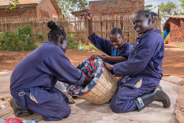 Refugees living in a settlement in Western Uganda, have been trained as local Artisan with skills in creating different energy efficient technologies to promote access and utilization of clean energy at household level. © Save the Children